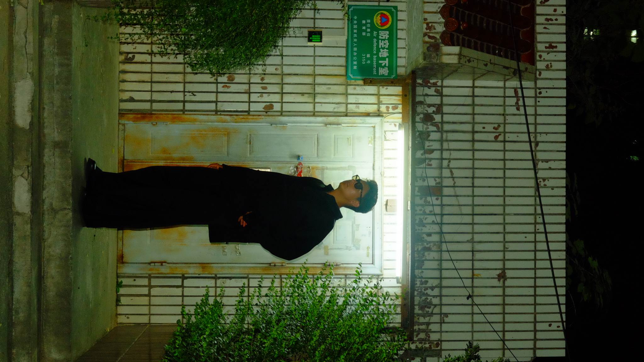 LUV DISK standing outside at night